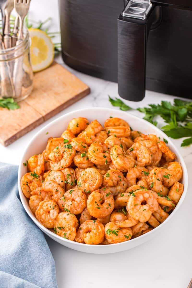 spicy shrimp in a white serving bowl