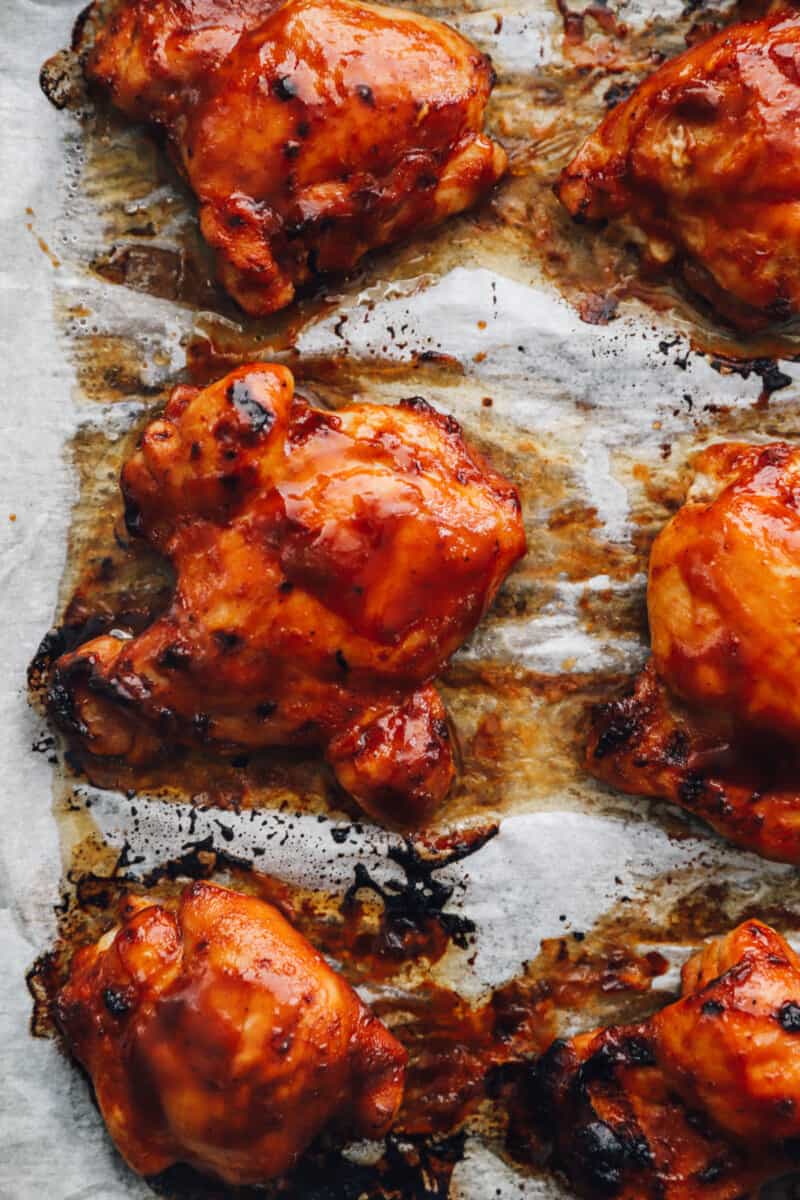 baked bbq chicken thighs on parchment paper