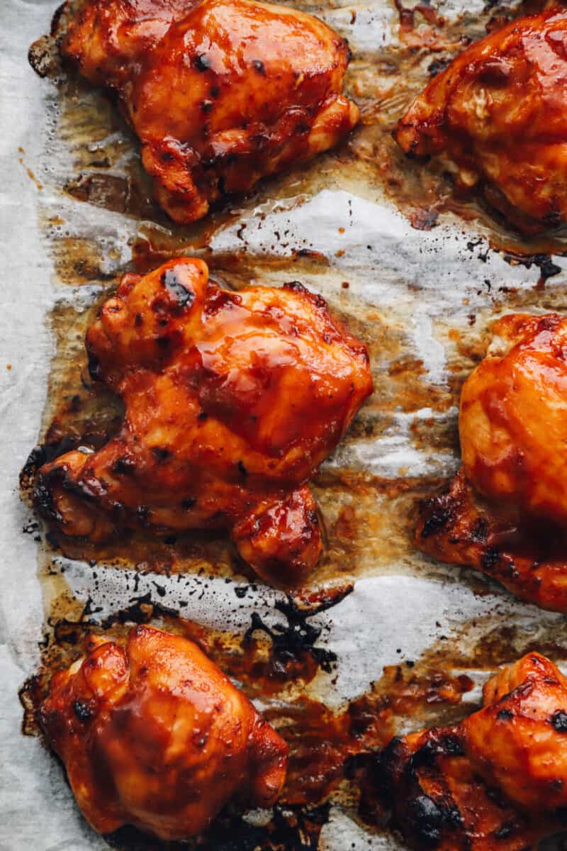 baked bbq chicken thighs on parchment paper