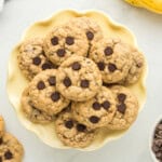 overhead image of banana breakfast cookies on a yellow plate - 12