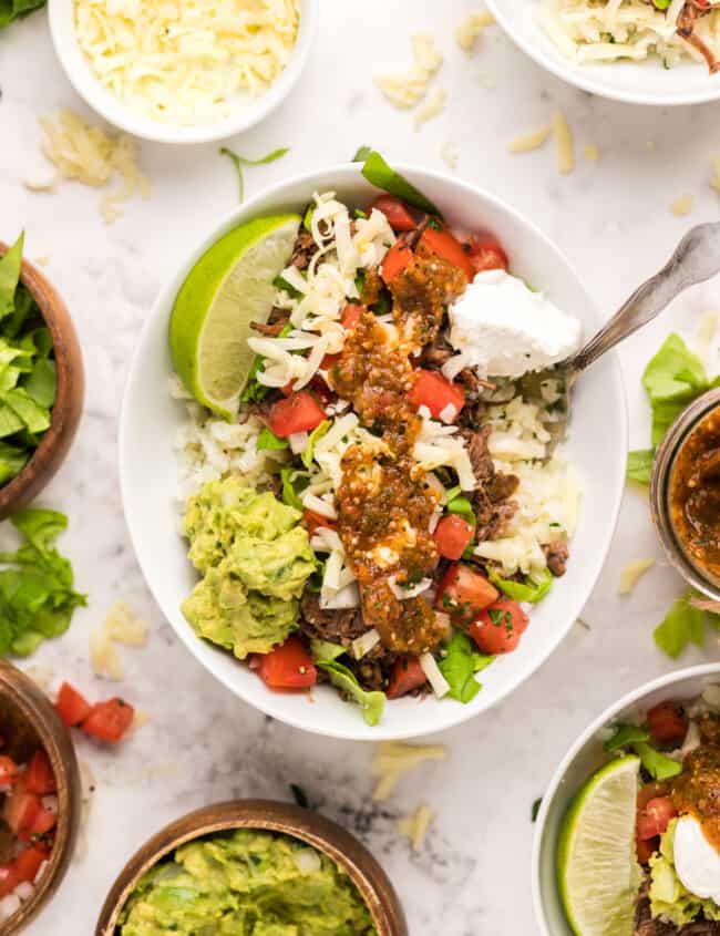 overhead image of assembled barbacoa burrito bowls