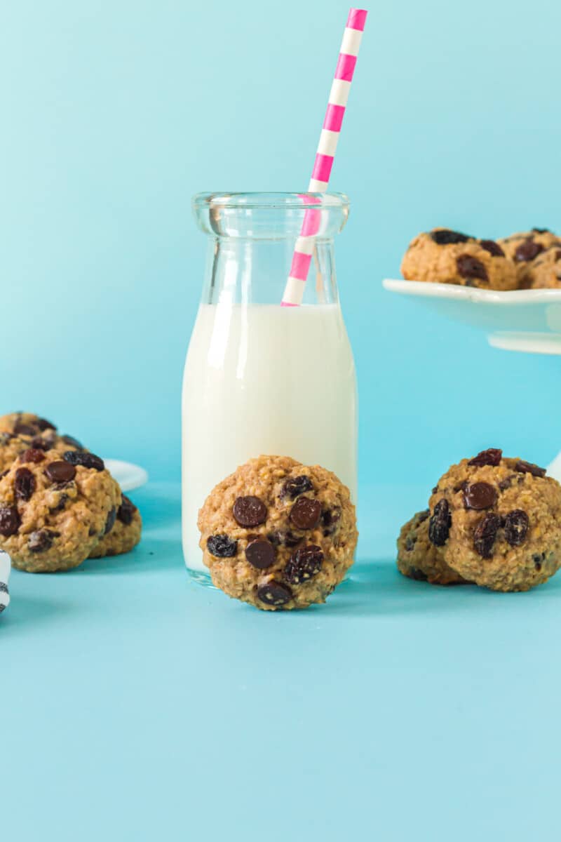 chocolate chip breakfast cookies with a glass of milk with a straw