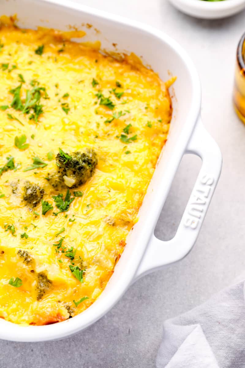 broccoli rice casserole in a white baking dish