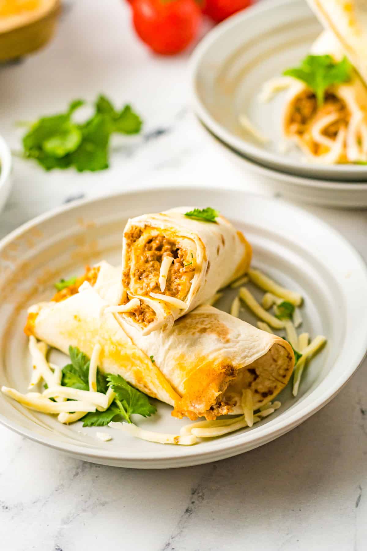 beef taquitos on a gray plate