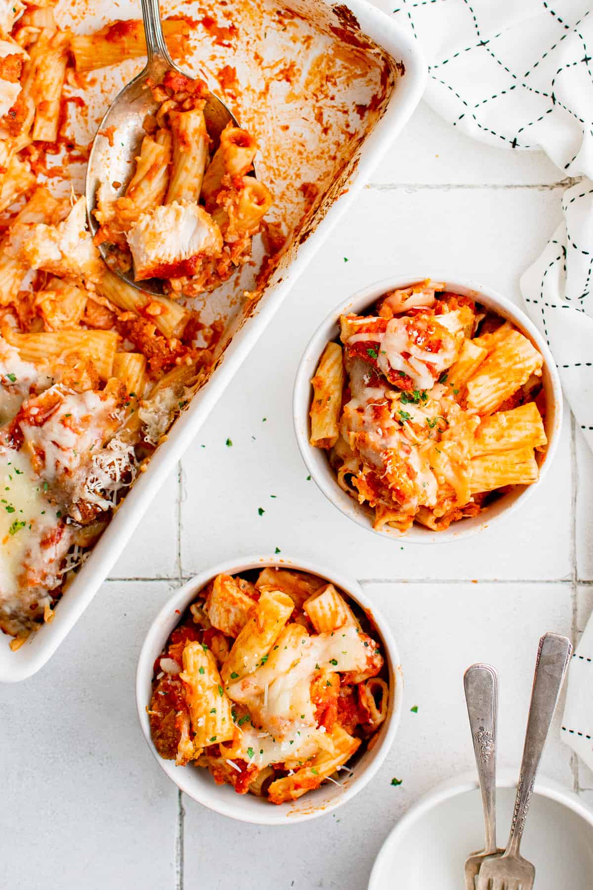 overhead image of 2 bowls of chicken parmesan casserole