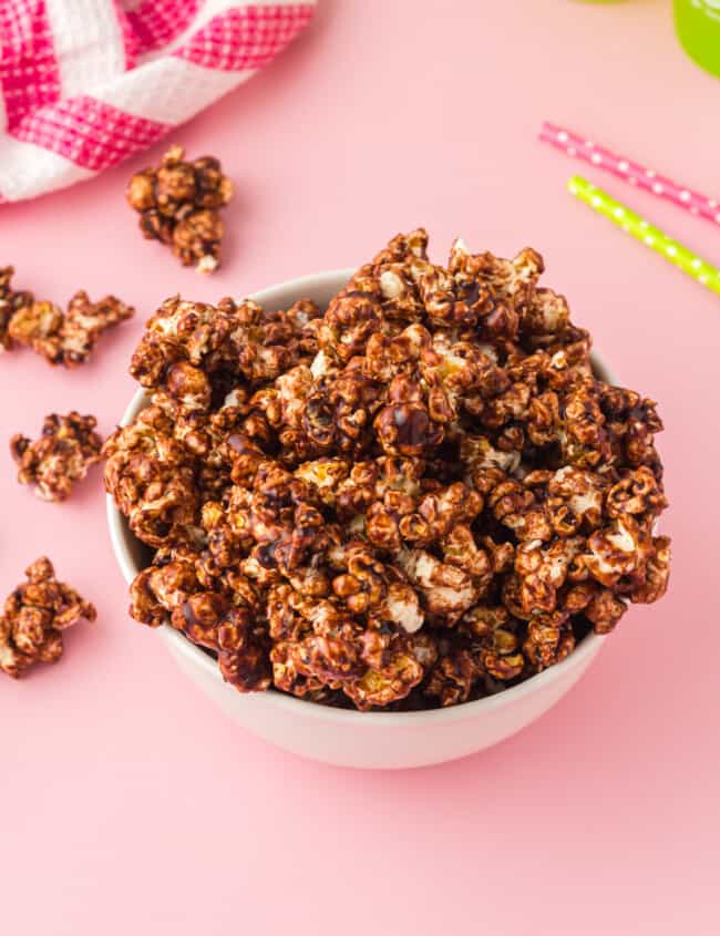 chocolate popcorn in a white bowl