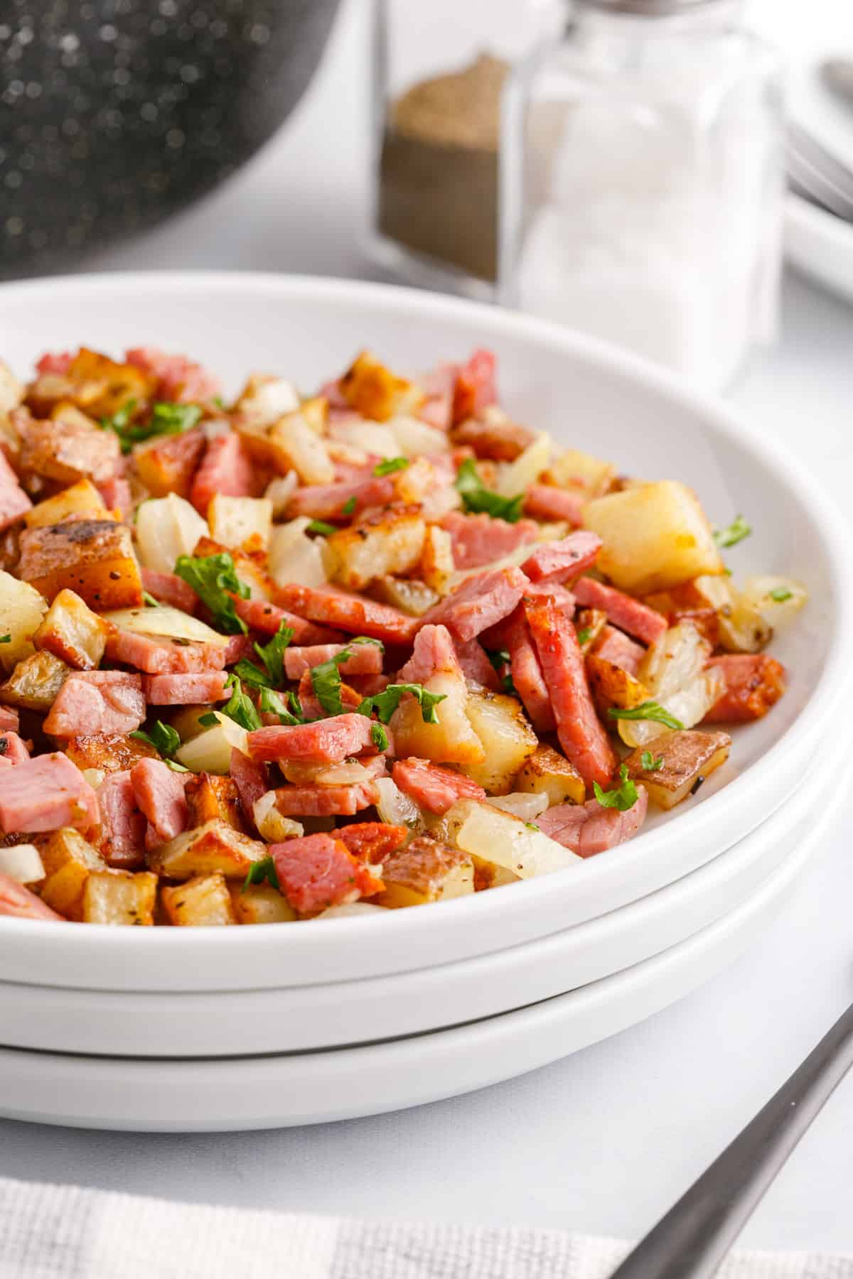 corned beef hash on a white plate