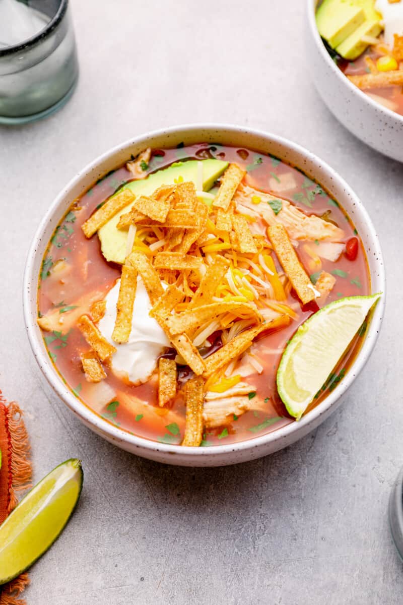 chicken tortilla soup in a white bowl