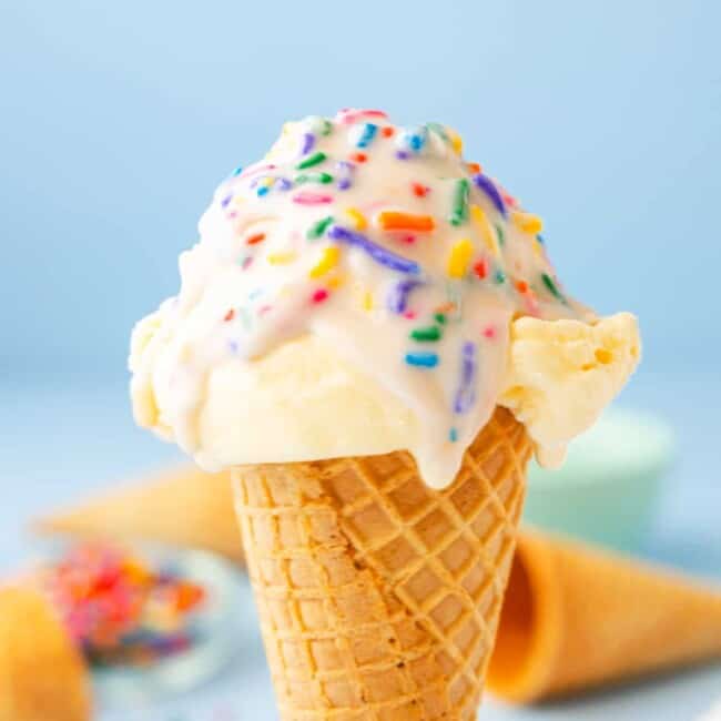 vanilla ice cream cone topped with funfetti magic shell