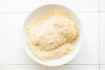 breaded chicken breast coated in bread crumbs