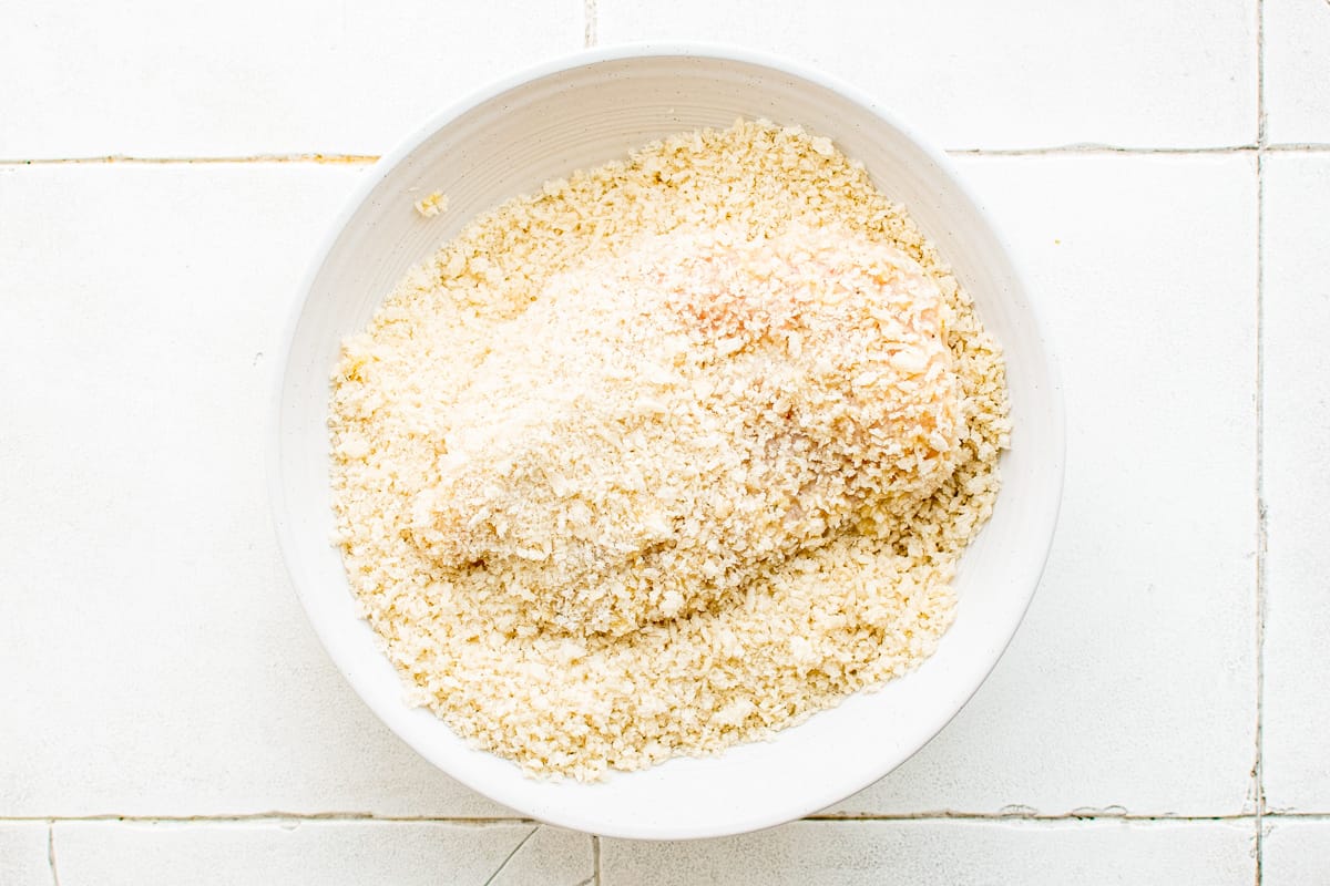 breaded chicken breast coated in bread crumbs