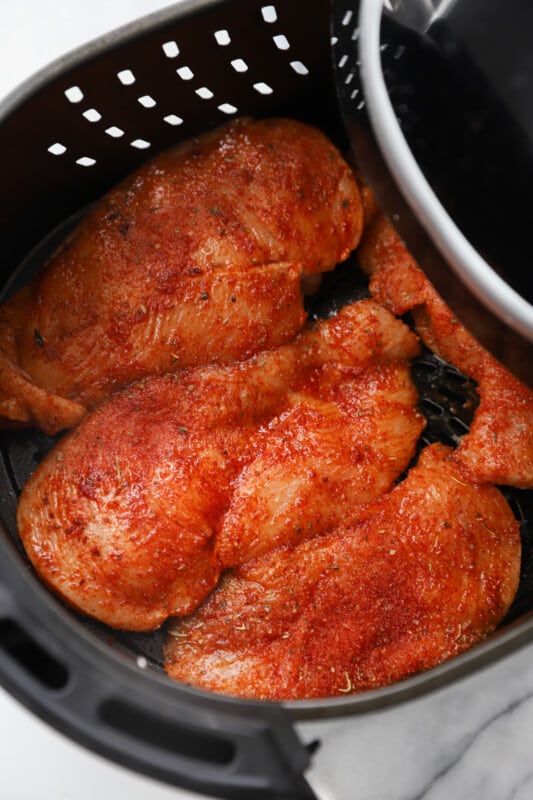 chicken breasts in air fryer before cooking