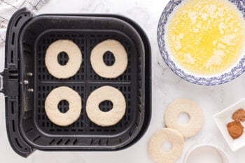 biscuit donuts in an air fryer before cooking