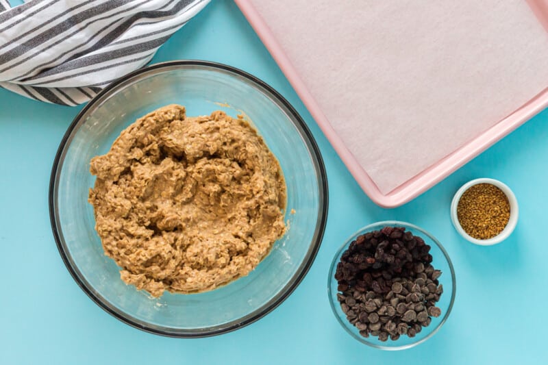 breakfast cookie dough in a glass bowl before raisins and chocolate chips are added