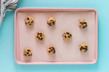 breakfast cookies on a parchment paper lined baking sheet before baking