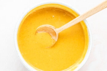chick-fil-a sauce in a white bowl with a wood spoon