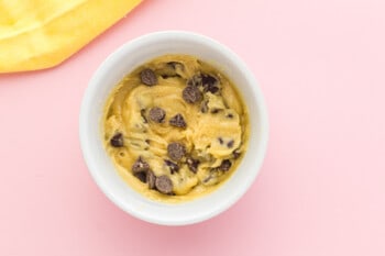 chocolate chip cookie dough in a mug before baking