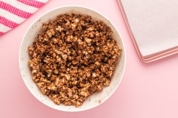 chocolate popcorn in a white bowl