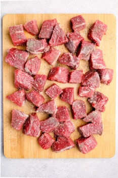 chunks of beef seasoned with salt and pepper