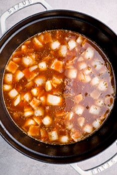 beef stew cooking in a Dutch oven