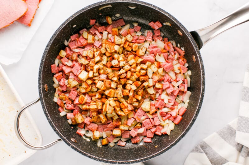 potatoes and corned beef in a skillet