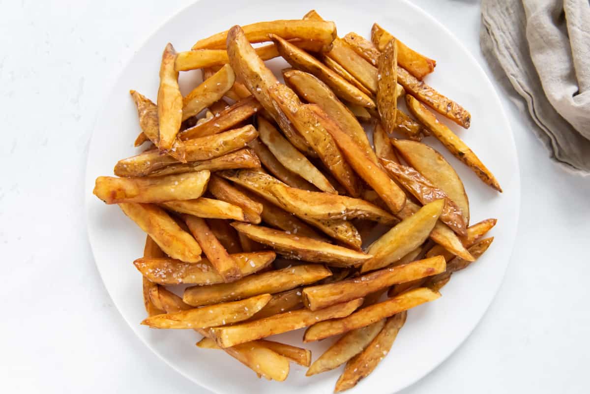 french fries on a white plate