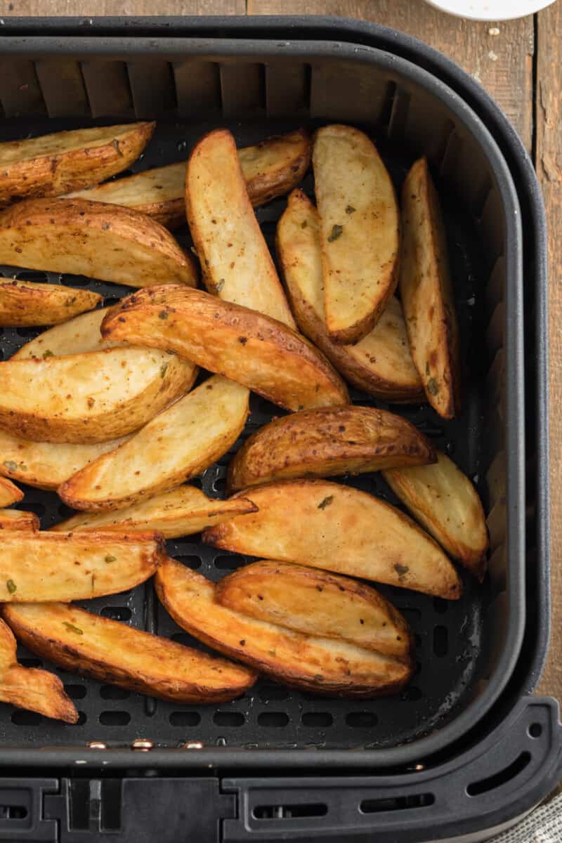 air fryer potato wedges in air fryer after cooking