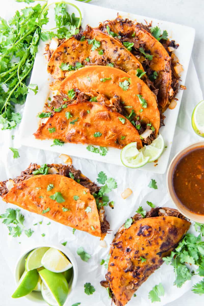 birria tacos on a white serving platter