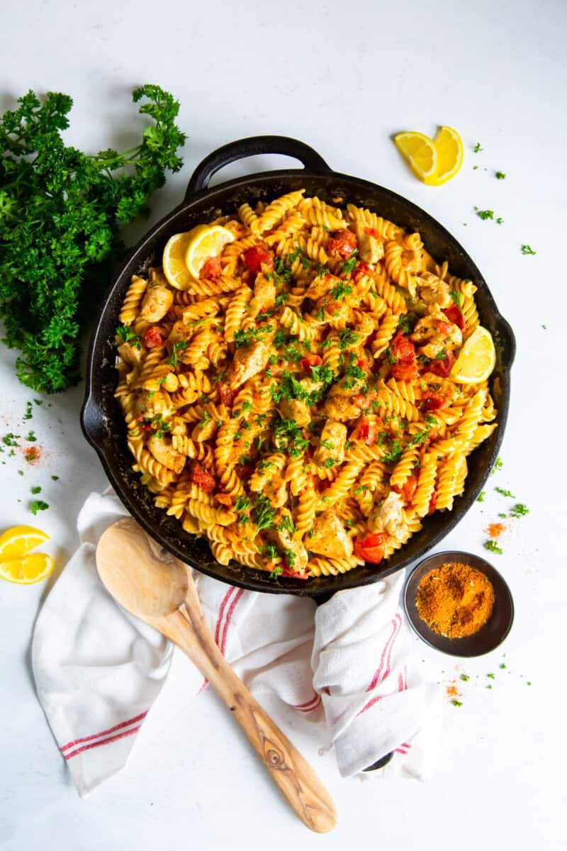 overhead image of cajun chicken pasta in a skillet