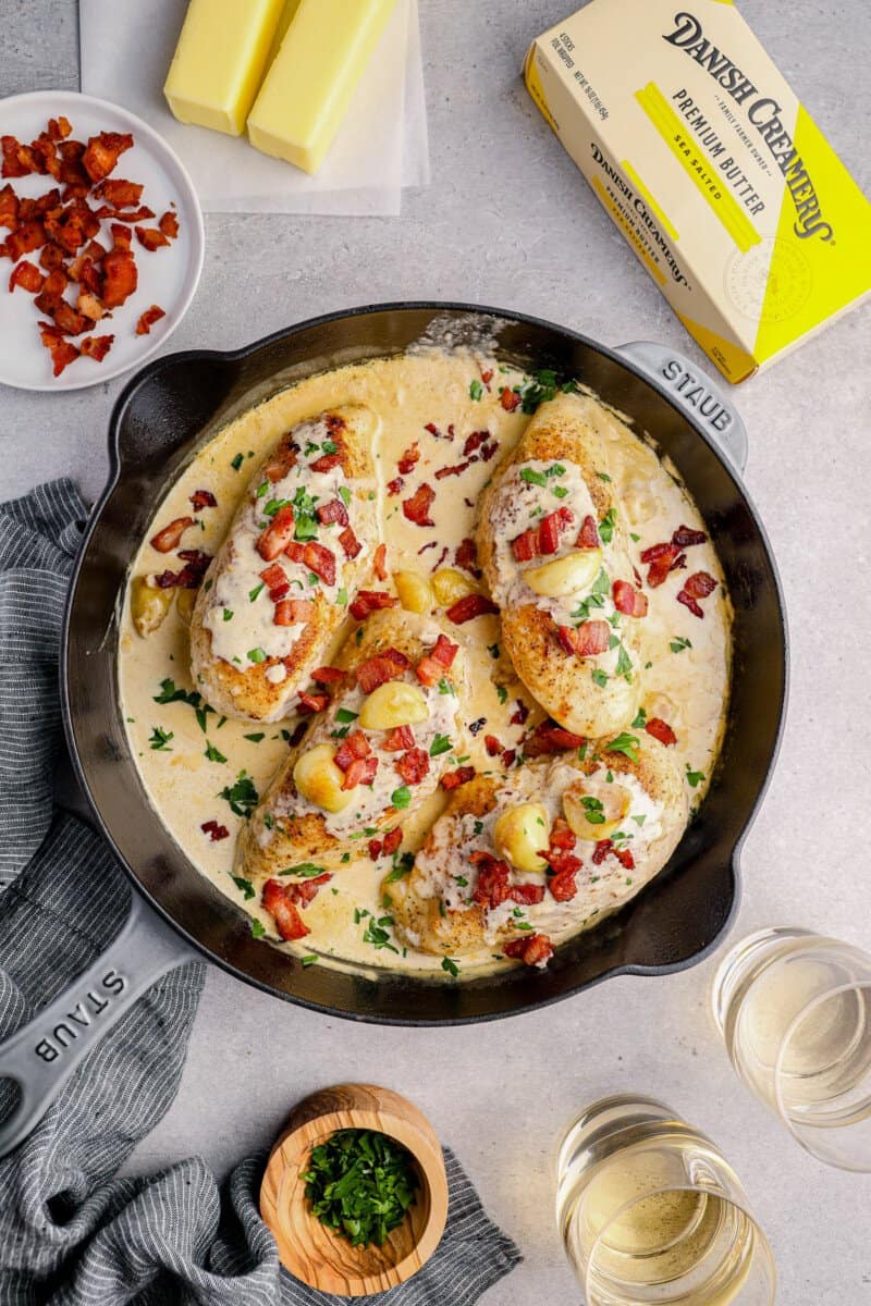 creamy garlic chicken with bacon in a skillet