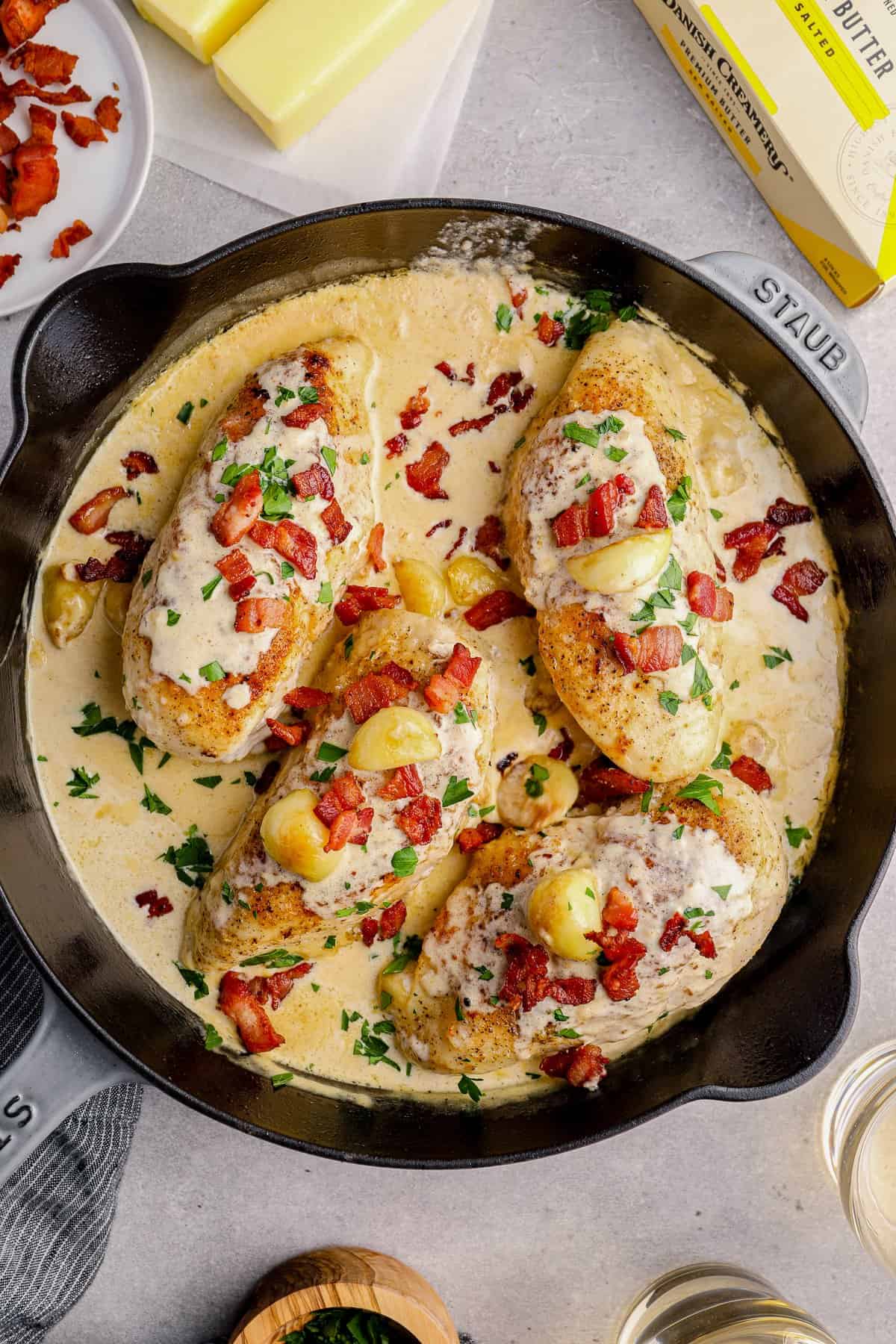 creamy garlic chicken with bacon in a skillet