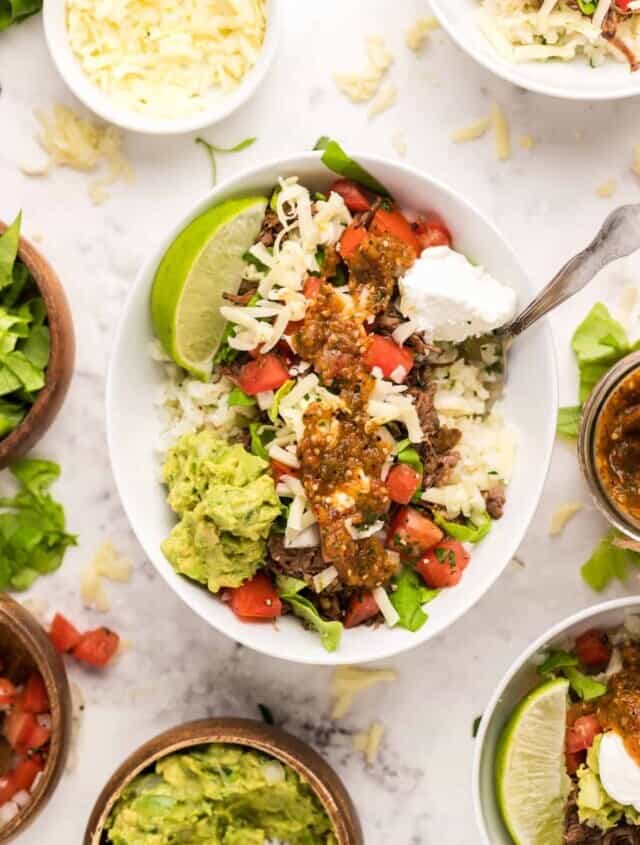 overhead image of assembled barbacoa burrito bowls