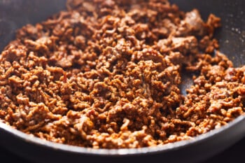 cooked seasoned ground beef in a skillet.