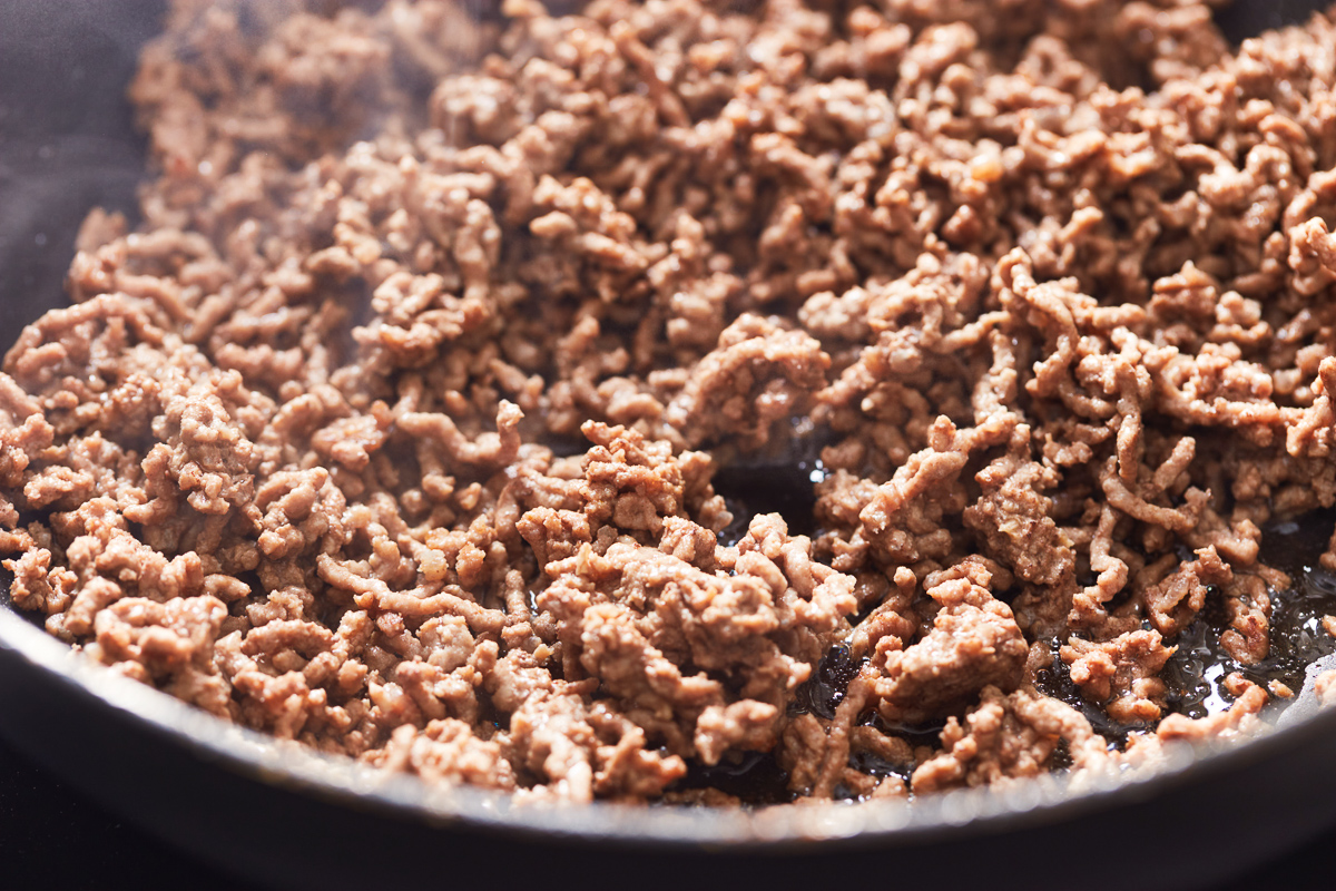 cooked ground beef in a skillet.