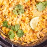 close up of crockpot corn dip in a crockpot.