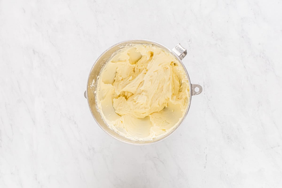 Cream cheese frosting in a mixing bowl.