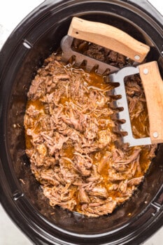shredded crockpot barbacoa beef with meat claws.