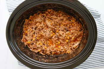 crockpot mexican shredded chicken in a crockpot.