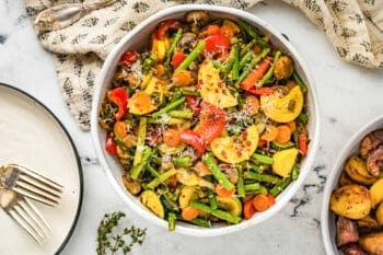 sauteed vegetables in a white serving bowl