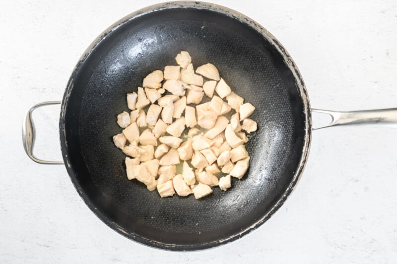 cooked chicken in a wok.