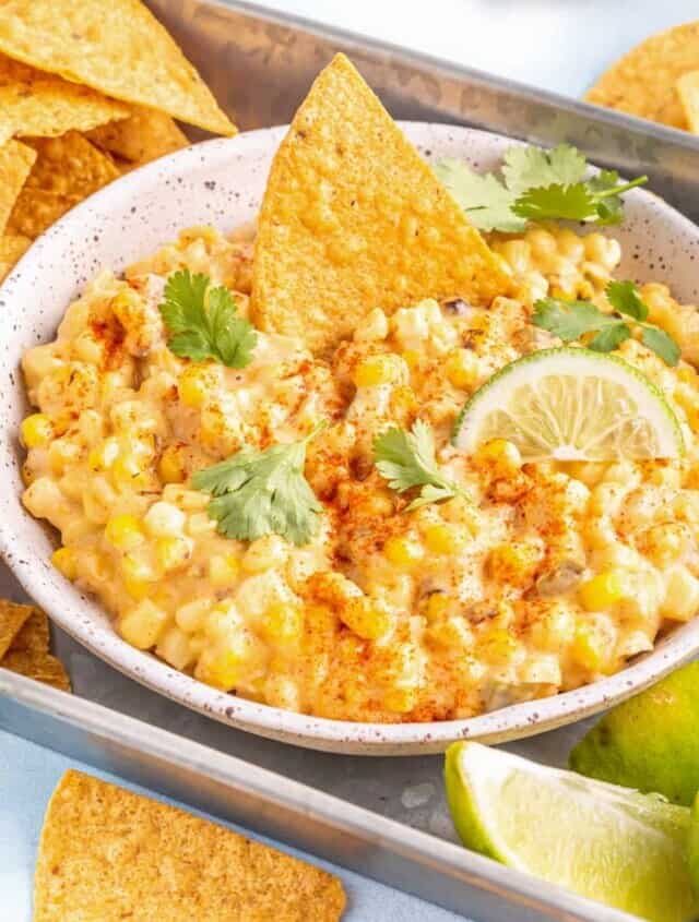 crockpot corn dip in a white bowl.