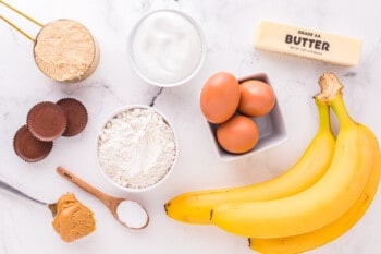 overhead view of ingredients for reeses peanut butter cup banana bread.