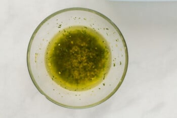 parsley garlic butter in a glass bowl.