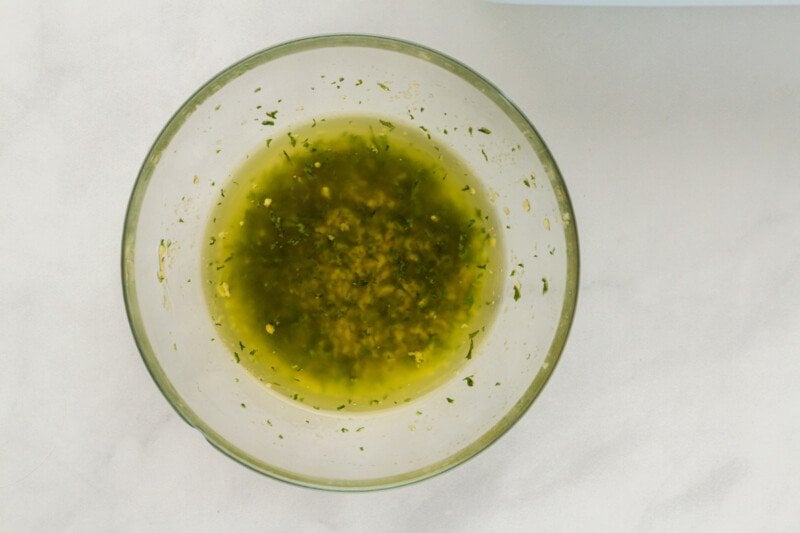 parsley garlic butter in a glass bowl.