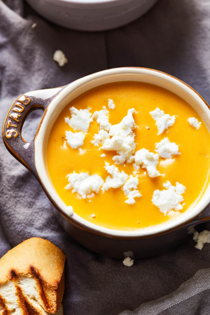 beer cheese soup topped with feta cheese