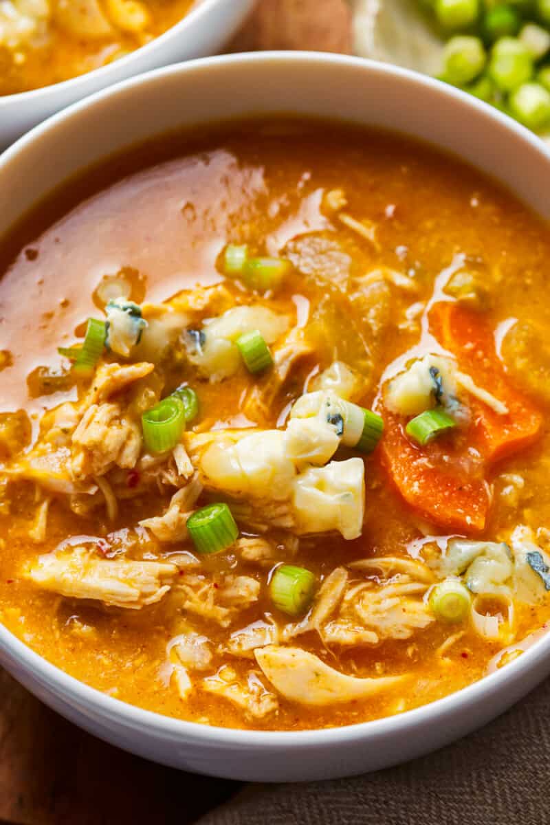 healthy buffall chicken soup with cauliflower, carrots, and shredded chicken