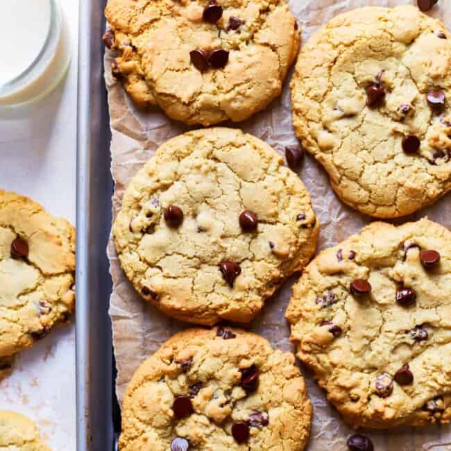 the best chocolate chip cookies on a baking tray