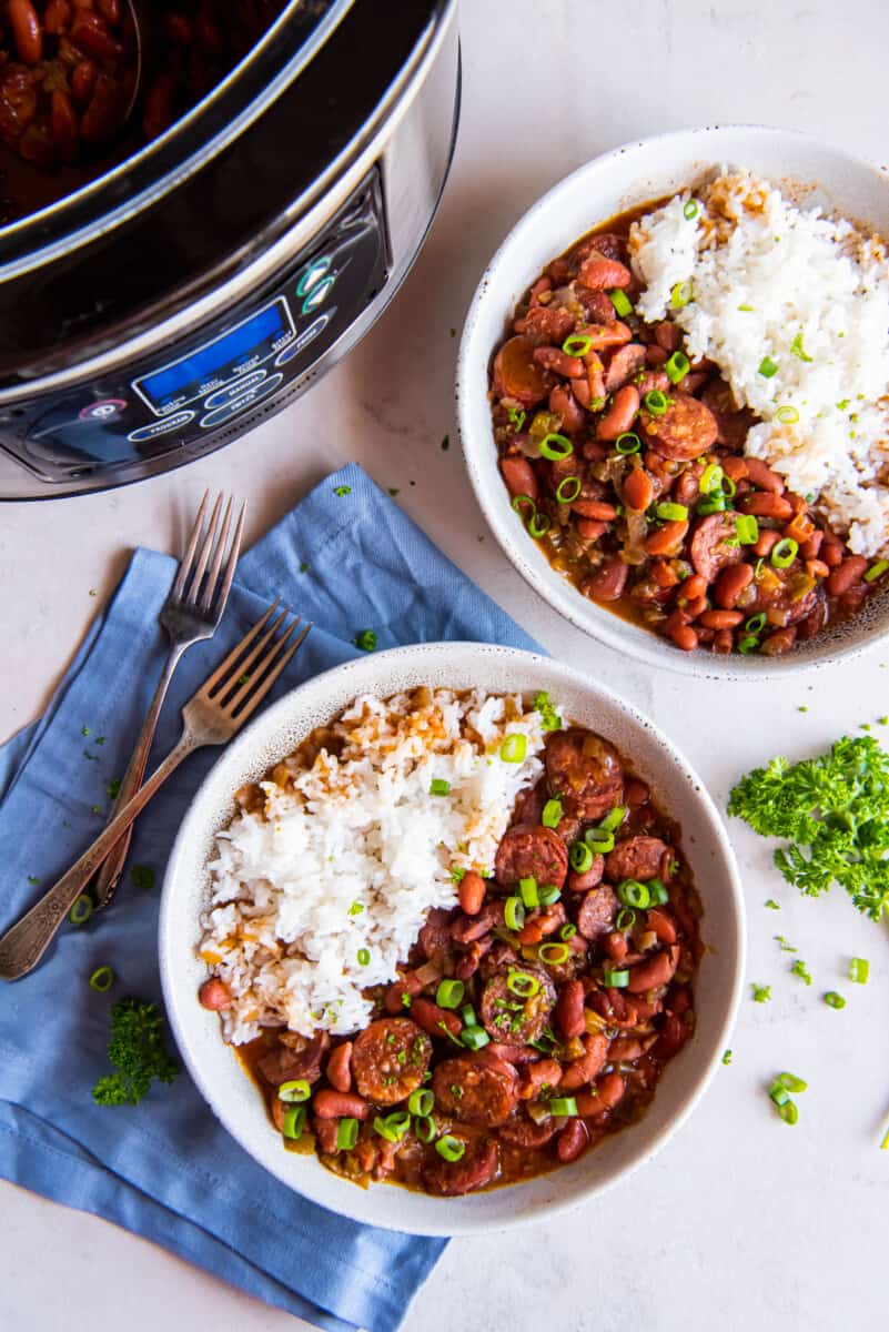 crockpot red beans and rice in white bowls.