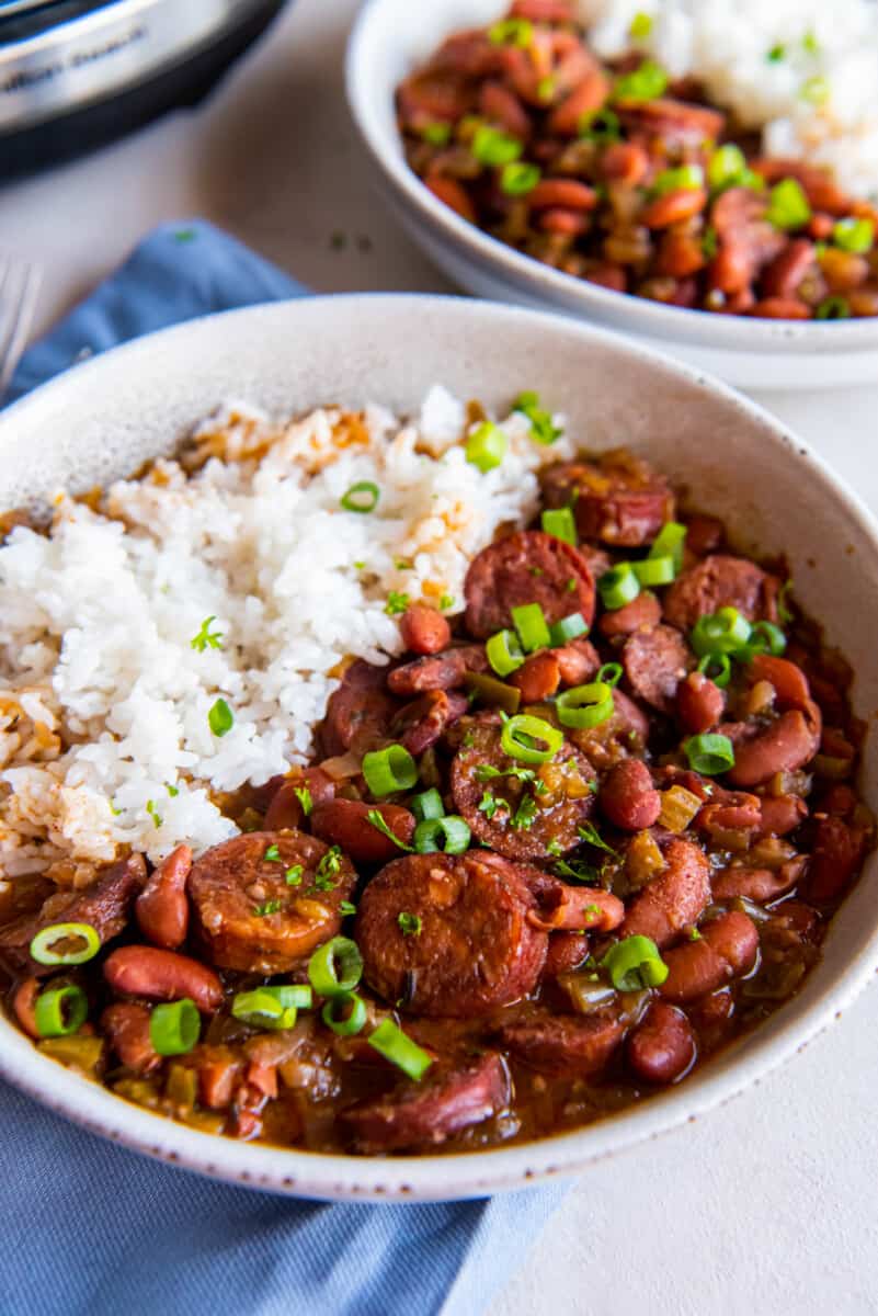 crockpot red beans and rice in a white bowl.