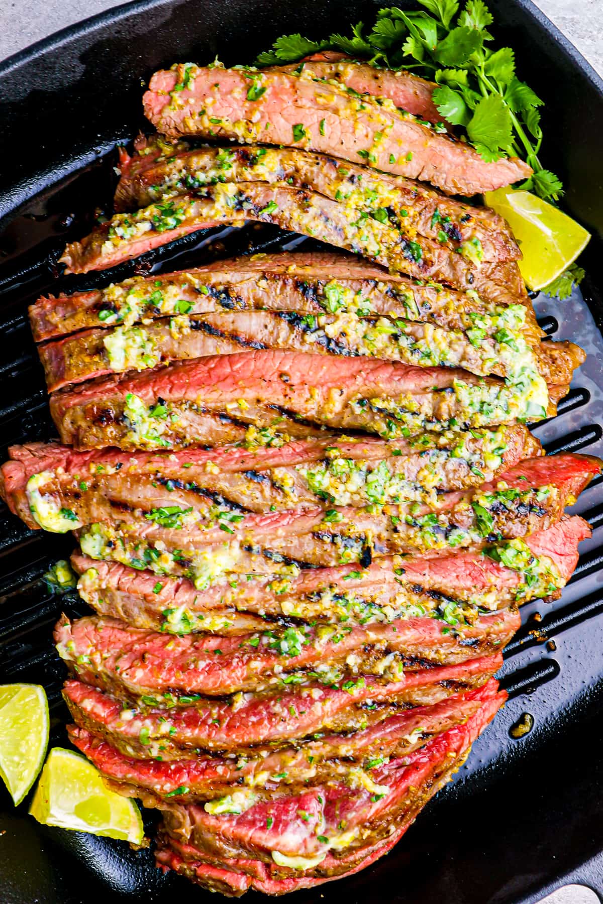 close up on grilled flank steak cut up intro thin strips